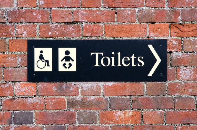 toilet sign on wall